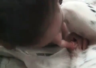 Tanned Mexican cutie is playing with a sweet Dalmatian